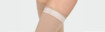 One leg with a compression stocking that has an silicone border