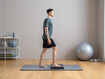 Exercice 1: équilibre unipodal sur un coussin d'équilibre avec flexion du genou 