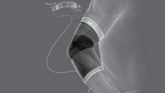 Tegning Maksimal bevægelsesfrihed Tegnet fremhævelse af de trykminimerede afslutninger på Epi Xtra-albuebandage