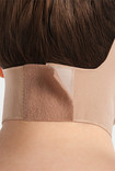 Verschluss einer Kompressionsgesichtsmaske im Nacken