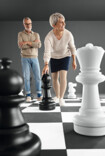 Woman and man wearing Juzo Dynamic and standing on a large chessboard