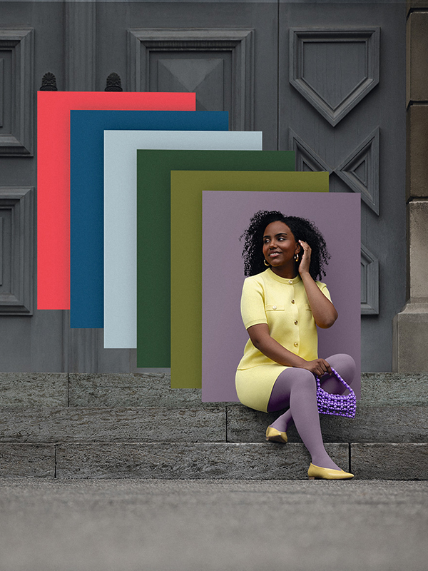 A woman in a yellow dress and purple compression stockings is sitting on a flight of stairs. In the background are blocks of colour in the latest trendy shades A woman in a yellow dress and purple compression stockings is sitting on a flight of stairs. In the background are blocks of colour in the latest trendy shades